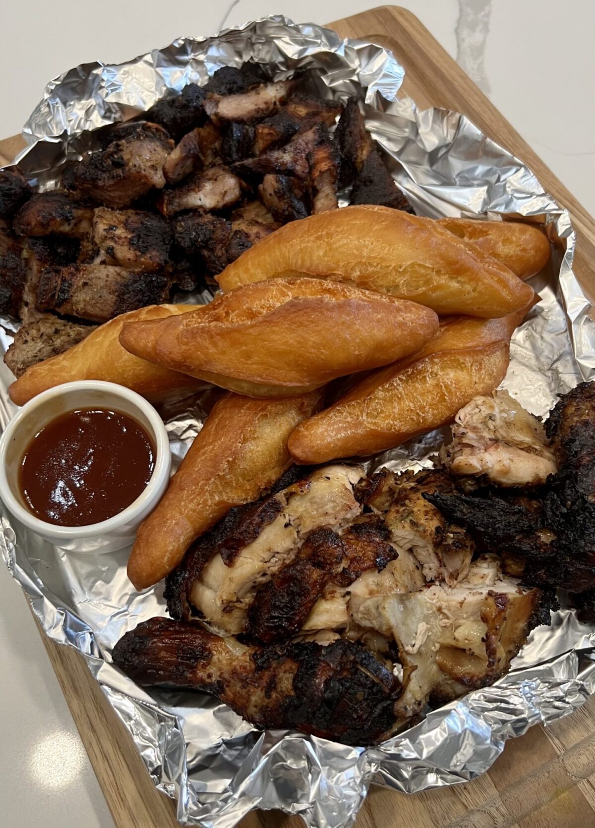 Jamaican Jerk Pork, Jerk Chicken, and Fried Festival platter.
