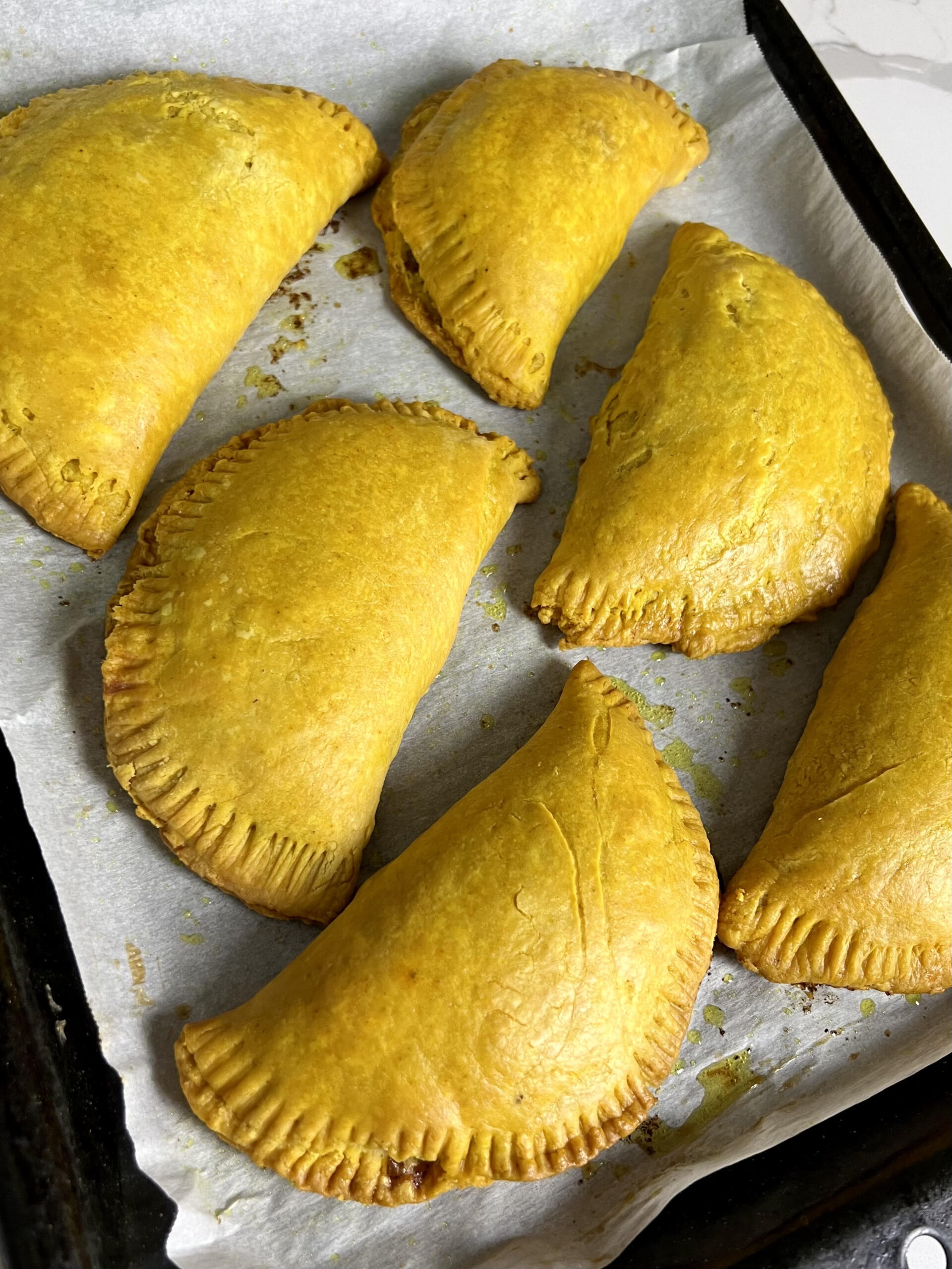 Flakey Jamaican Beef Patties fresh out of the oven.