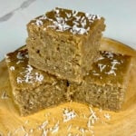 Jamaican Toto (Coconut Cake) sprinkled with coconut flakes