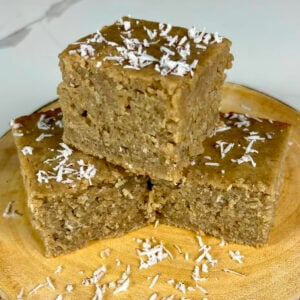 Jamaican Toto (Coconut Cake) sprinkled with coconut flakes