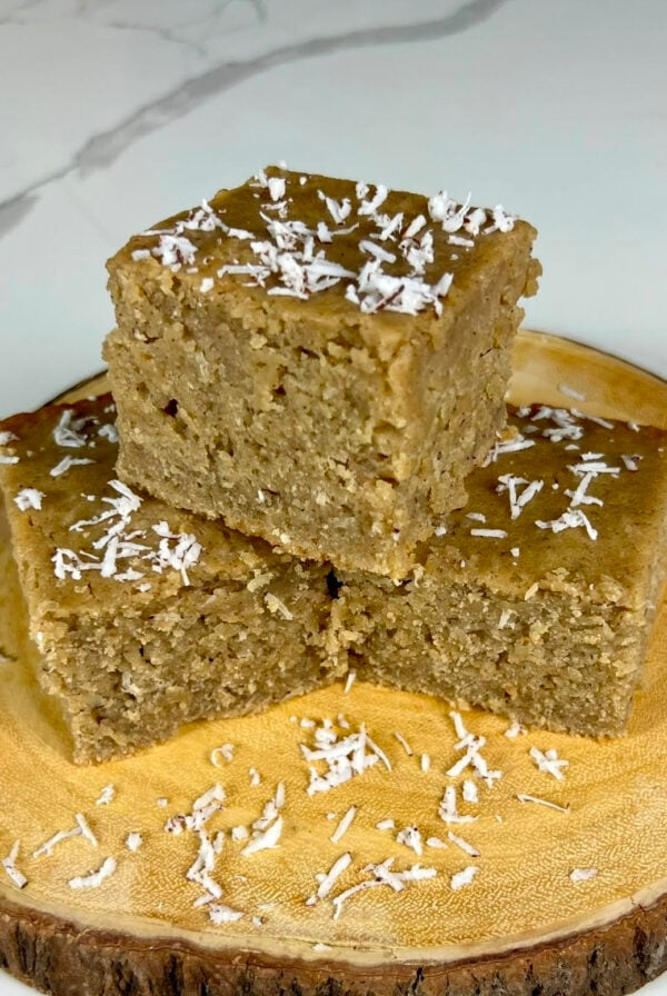 Jamaican Toto (Coconut Cake) sprinkled with coconut flakes